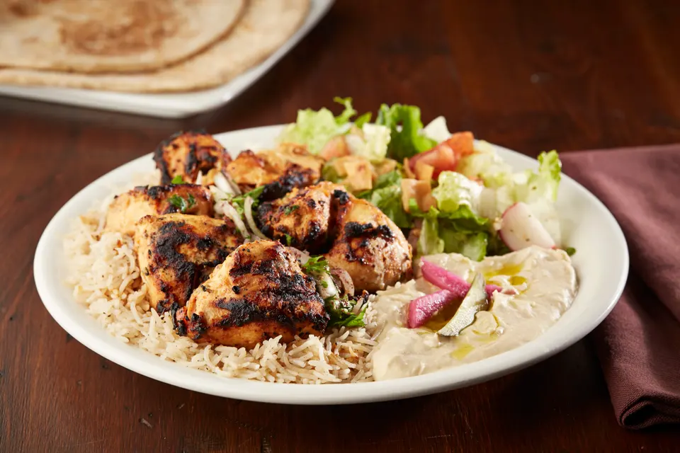 Palmyra charbroiled chicken kebab with rice and fresh salad